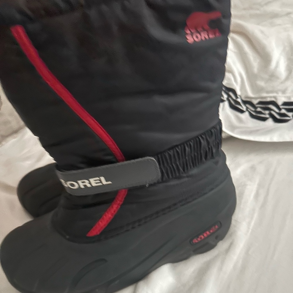 Boys Sorel Black Boots with Red Trim- like new. worn twice
